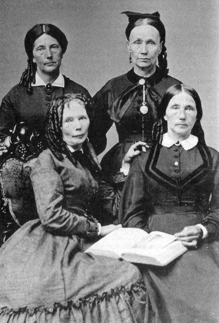 Delia Webster, bottom left, with sisters in later years
